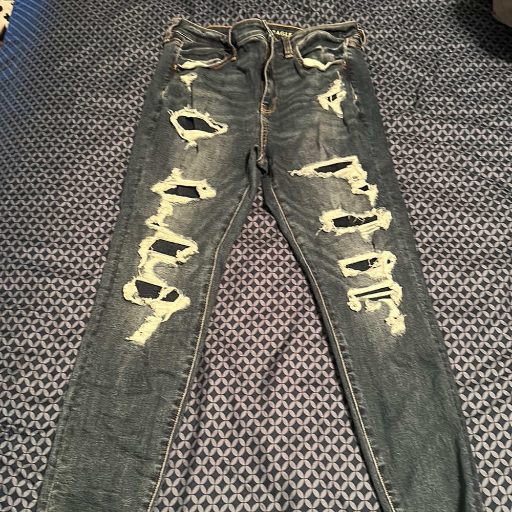 3 pairs of American Eagle jeans, lightly used.